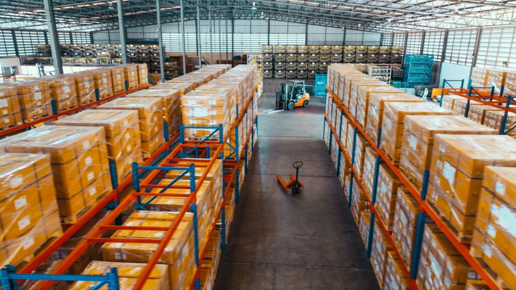 High angle view, merchandise packages stores on shelf rack in factory warehouse. Logistic industry business, industrial job career, factory work environment concept